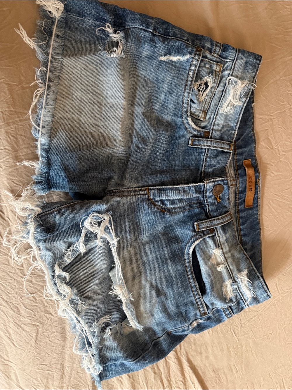 Distressed Light Blue Denim Cutoff Shorts